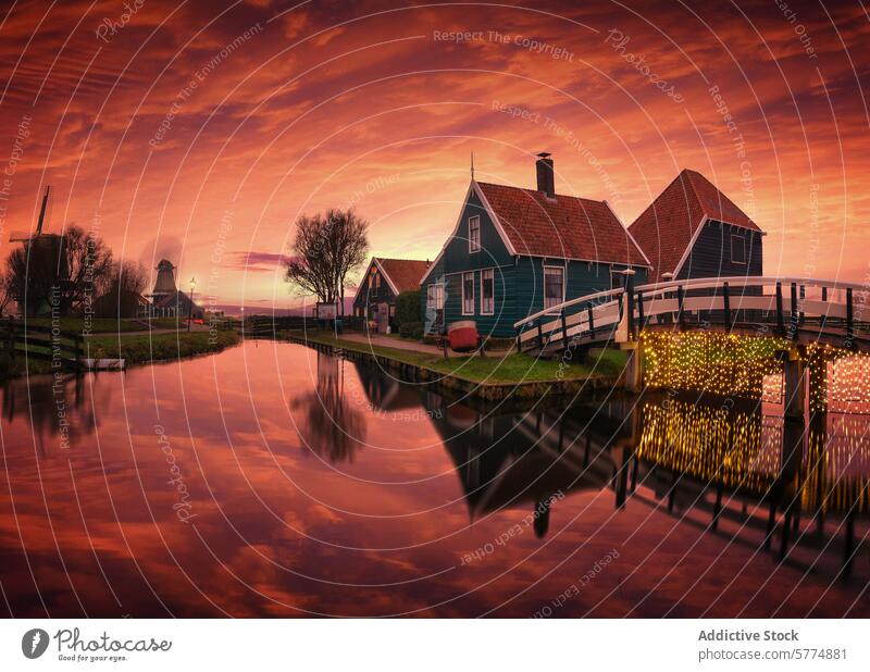 Serene sunset over traditional Dutch houses in Amsterdam amsterdam netherlands dutch houses reflection water canal serene tranquil vibrant historic landscape