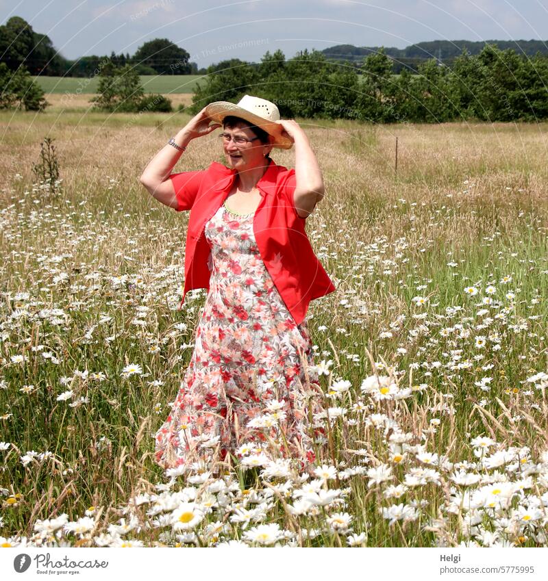 summery dressed woman stands in a flower meadow Human being Woman feminine Adults Dress Floral Blouse Rudbeckia Flower meadow Margarites Margarite Meadow Summer