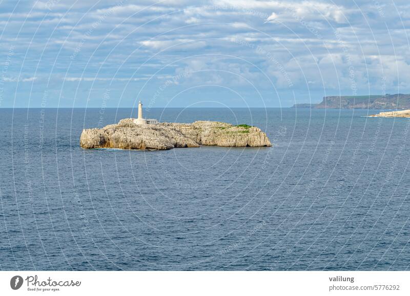 View of Mouro Island and its lighthouse, Santander, Spain Cantabria Europe bay beach beautiful blue cliff coast coastal coastline island landmark landscape