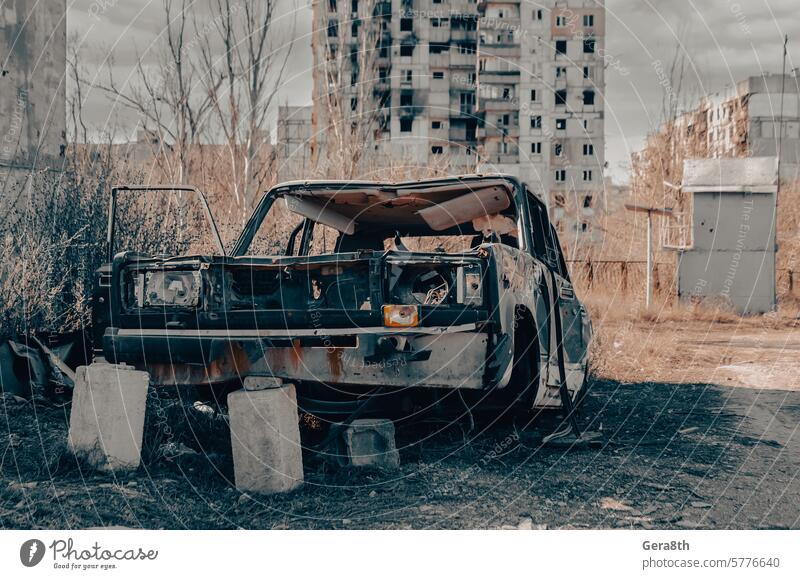 damaged and looted cars in a city in Ukraine during the war Donetsk Kharkov Kherson Lugansk Mariupol Russia Zaporozhye abandon abandoned attack blown up
