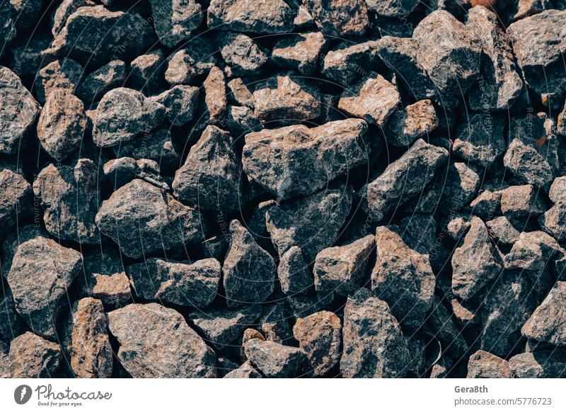 abstract background many small stones a lot of crushed stone architecture backdrop blank brown closeup construction crushed stone background