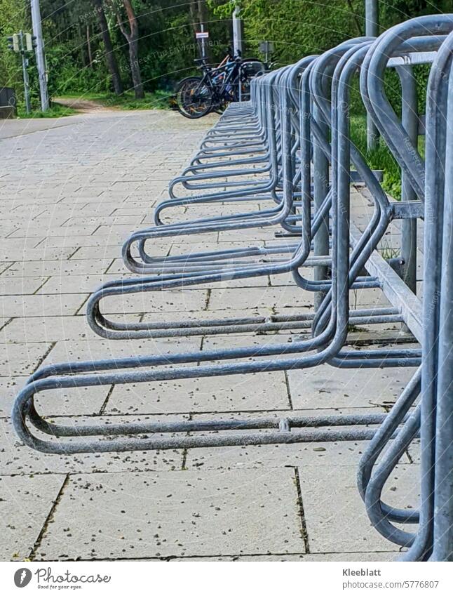 Parking spaces still available - bicycle parking system on public land Bicycle Cycling Means of transport switch off Public transit Mobility Wheel Town