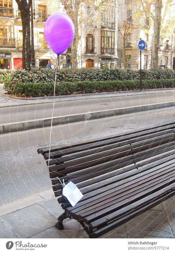 Bench with an attached balloon on a boulevard bench Balloon Dreaming Longing Expectation Hope Curiosity Lonely Wait