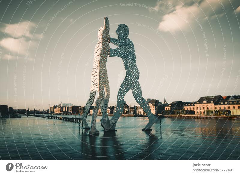 Molecule Man and the wholeness and unity within the world Spree Berlin Capital city Tourist Attraction Sightseeing Sunlight Treptow Contrast City Shadow River