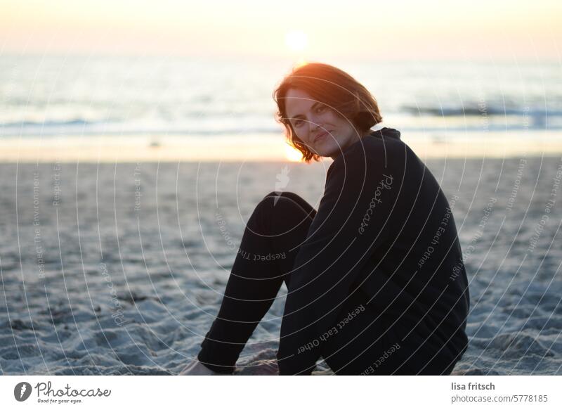 SMILE - BEACH - DAWN - SEA Woman 30 to 35 years Smiling timid Beach Sand Ocean Sunset Adults Young woman Time to yourself Relaxation To enjoy relaxation