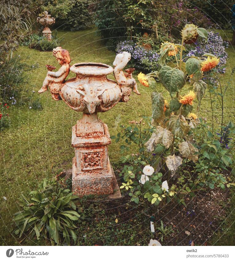 old garden Well Arts and crafts fountain figure Past Patina Statue Colour photo Exterior shot Garden Autumn Figures plants Idyll Old Meadow Flowers and plants