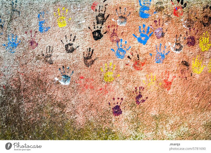 relics Imprint Creativity Hand Palm of the hand Wall (building) handprint Structures and shapes Multicoloured Teamwork Together Many Touch Tracks Decoration