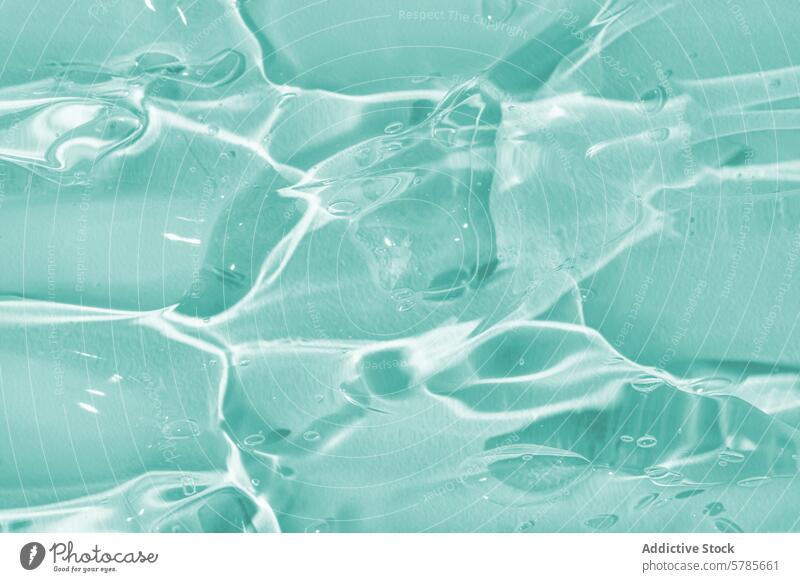 Soothing Aqua Gel Texture with Light Reflections texture gel aqua translucent glossy reflection close-up soothing light cool smooth abstract background material