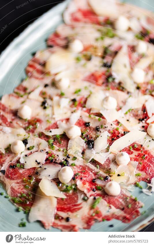 Exquisite beef carpaccio with parmesan and herbs seasoning plate gourmet appetizer shaved garnished fresh prepared delicious artistic presentation cuisine