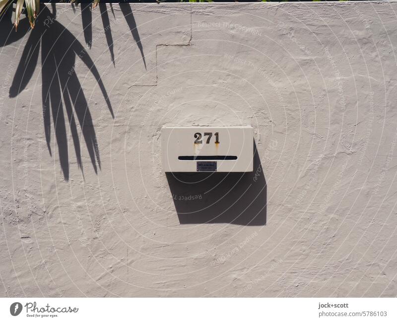 Letterbox 271 with silhouette Mailbox Mailbox slot number House number Neutral Background Signs and labeling Authentic Sunlight Shadow Digits and numbers