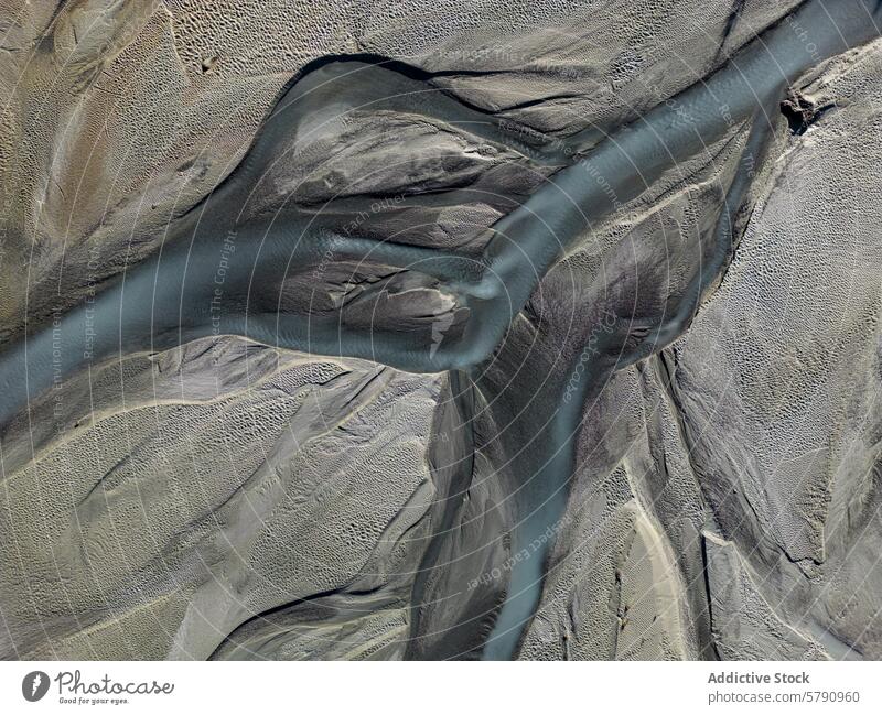 Aerial View of Intricate Braided River Channels aerial view river braided channel pattern sediment watercourse nature geomorphology intricate landscape erosion