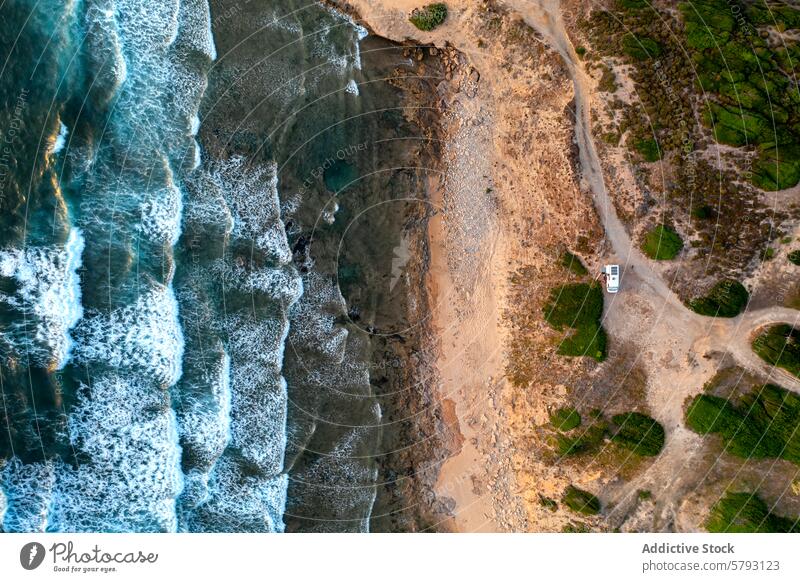 Aerial view of a rugged Sardinian coastline sardinia italy drone aerial view sea beach waves foaming remote vehicle shore landscape nature water mediterranean