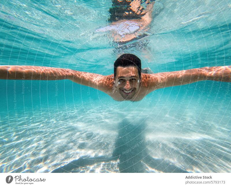 Man Enjoying a Swim in Clear Waters of Sardinia sardinia italy swimming underwater man crystal-clear turquoise summer refreshing cheerful aquatic leisure
