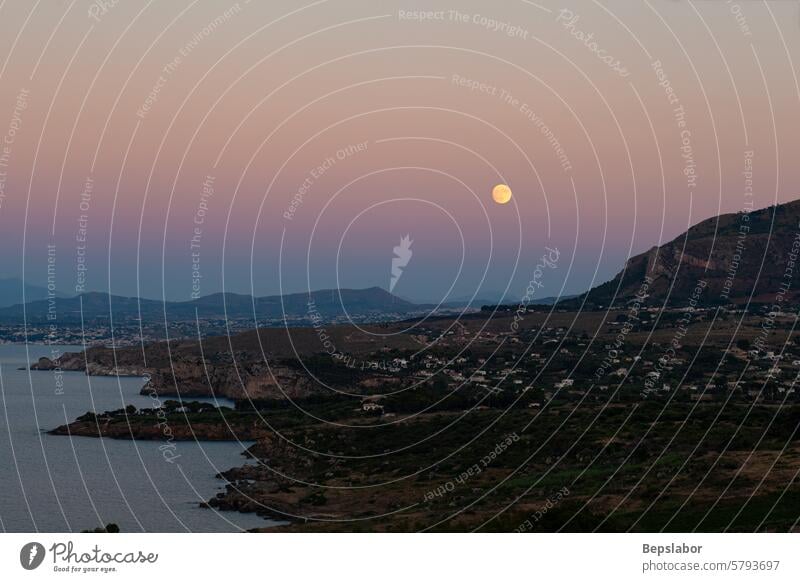 Panoramic picture with moon. Sunset on the paradise Mediterranean sea bay near Scopello italy nature island rock blue vacation water mediterranean top view