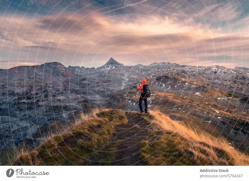 Hiker observing the Pic de Anie in the Pyrenees in autumn hiker pic de anie pyrenees dusk light solitude adventure backpack outdoor nature mountain peak