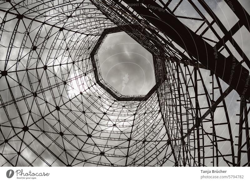 View upwards through the steel frame Industrial architecture cooling tower Industrial monument Mine Coking plant reinforced concrete construction