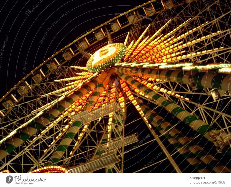 Ferris wheel at night. Third. Theme-park rides Festival Shooting match Amusement Park Holy Synod Night Dark Light Romance Exterior shot Visual spectacle fair