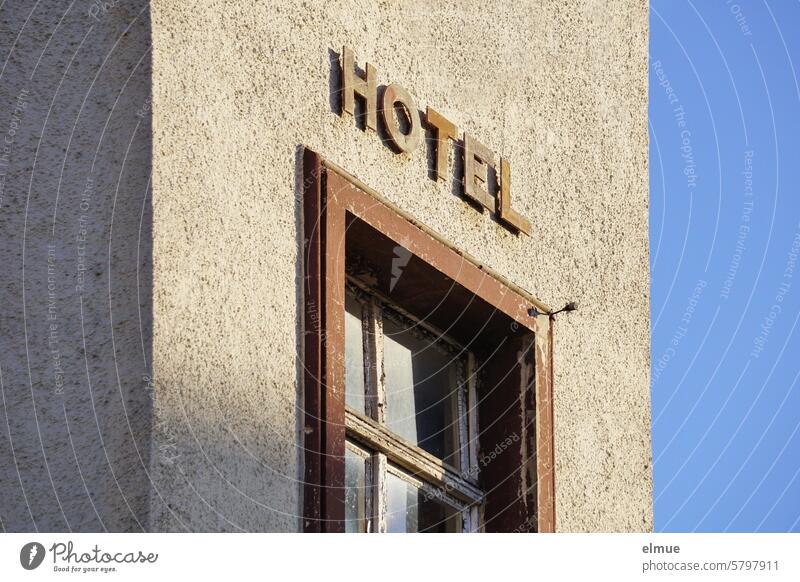 HOTEL - lettering on a dilapidated building Hotel overnight Accommodation Nostalgia Window Hotel window Vacation & Travel Hostel dwell spend the night Blog