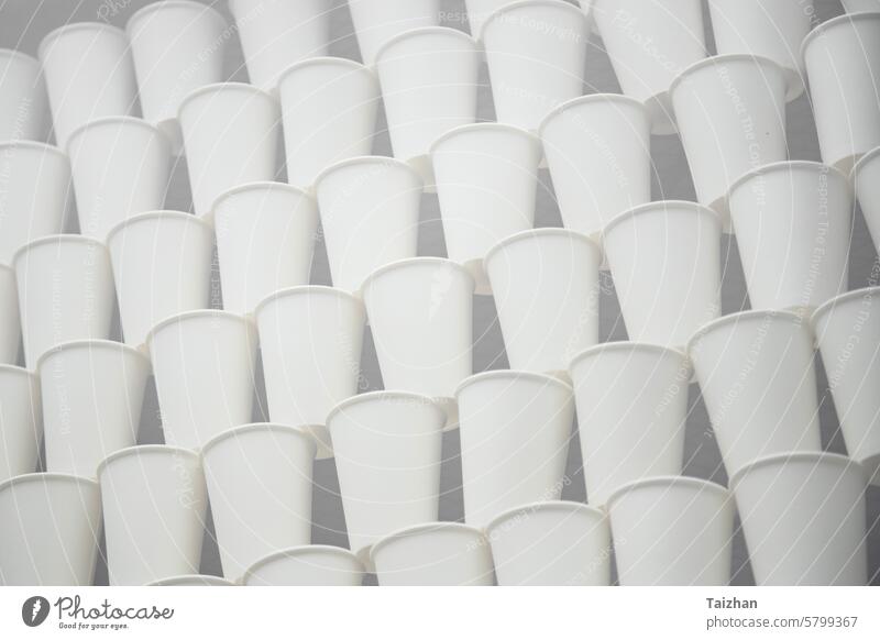 white paper cups on the gray background .    soft focus aroma beverage blank break breakfast cafe cafeteria caffeine cappuccino cardboard close up closeup