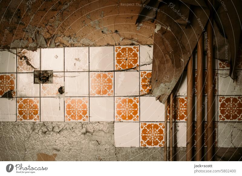 Tiles are broken and lost Wall (building) lost places Weathered Broken Change Apocalyptic sentiment Ravages of time Old Dirty metal pipe rusty Decline