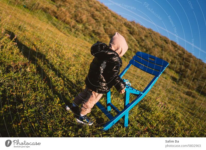 Little child playing in nature little little flowers little man little boy little child Child childhood Childish children Playing Playful Nature Blue sky
