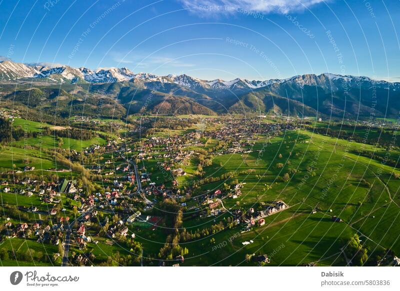 Aerial view of Tatra mountains and Zakopane town at sunset tatra mountains giewont zakopane valley landscape nature aerial view poland countryside field forest