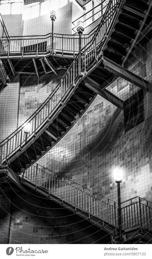 Stairs in the stairwell of the old Elbe tunnel in Hamburg St. Pauli, vertical, black and white Old Elbe Tunnel Elbtunnel St. Pauli Elbtunnel staircases Shaft