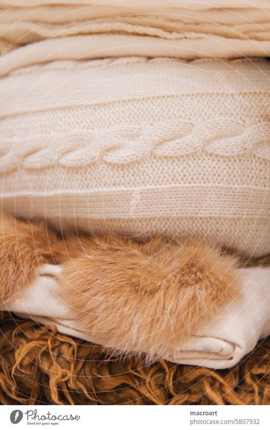 Close-up of various furs, blankets and knitwear cover rabbit fur artificial animal skins Doily Decoration homestyling Brown Beige color concept fleece blanket
