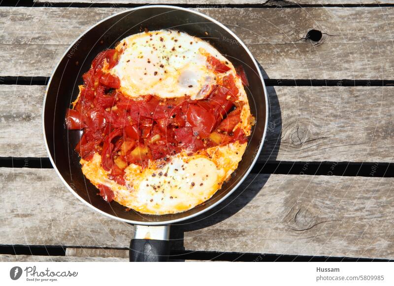 shakshuka frying pan cook fried natural recipe breakfast cheese appetizing kitchen nutrition tradition egg organic product delectable homemade gourmet