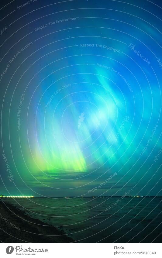 Northern lights over the Baltic coast in Schelswig-Holstein northern lights Aurora Sky Night Illuminate astronomically Astronomy Aurora Borealis Nature Green