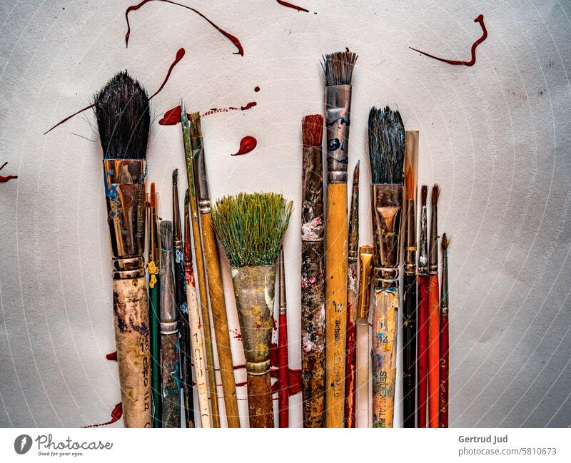 Old brushes on blotted paper Patina Paintbrush Deserted Detail Structures and shapes Subdued colour Painting (action, artwork) Painter Artist artistic needs