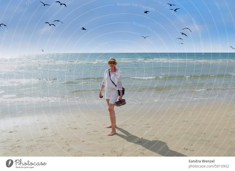 Woman on the beach of Costa Calma vacation Beach Sandy beach Ocean Relaxation