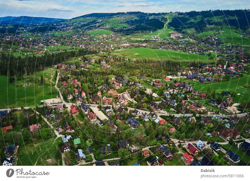 Aerial view of Tatra mountains and Zakopane town at morning tatra mountains zakopane valley landscape peak nature aerial view national park poland field forest