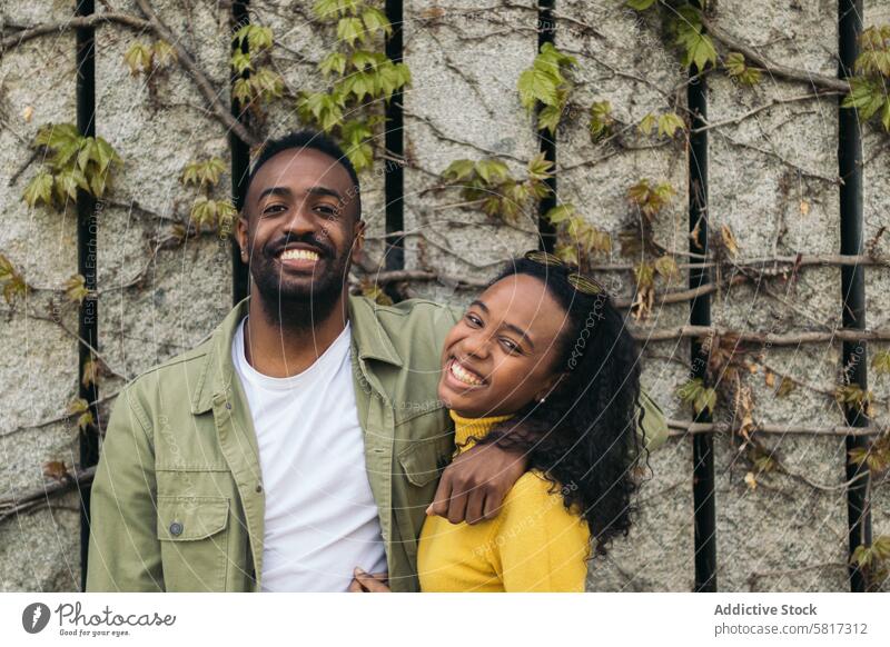 black couple portrait smiling and holding each other man woman love happy female together people young background relationship person romantic romance two girl