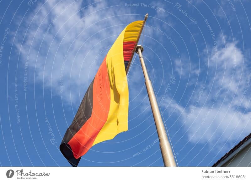 Federal flag of Germany on a flagpole German flag federal flag Flagpole Public Holiday