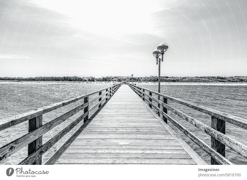 Graal Müritz pier, Baltic Sea, Germany. View of the land from the bridge. Black and white Sea bridge Ocean graal müritz Bridge country Barefoot Bay Beach