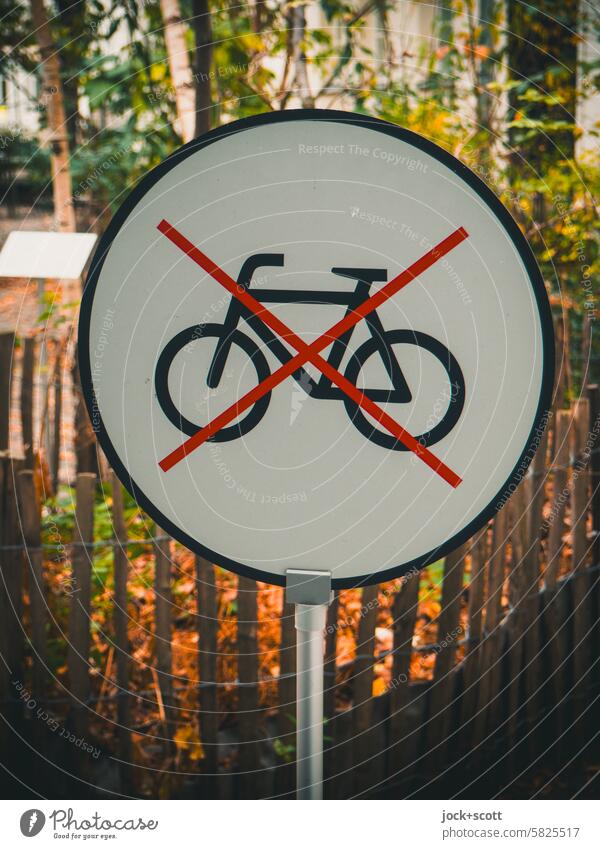 Riding a bicycle is prohibited here forbidden Signs and labeling no bicycles restricted regulate Prohibition sign Symbols and metaphors Warning label Signage