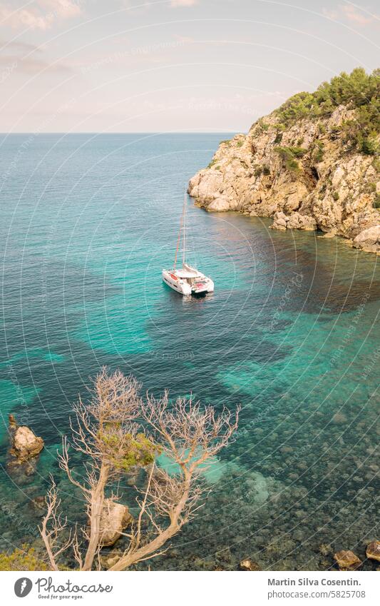Landscapes of the island of Ibiza. Cala d en Serra,  Sant Joan de Labritja, Ibiza. balearic balearic islands bay beach beautiful blue boat cala cala den serra