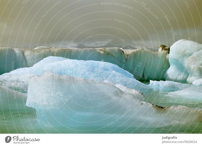 Iceland Glacier Frost Exceptional Fjallsárlón Cold naturally Lakeside Climate change Nature Elements Wild Weather Clouds Moody Water Iceberg Ice floe
