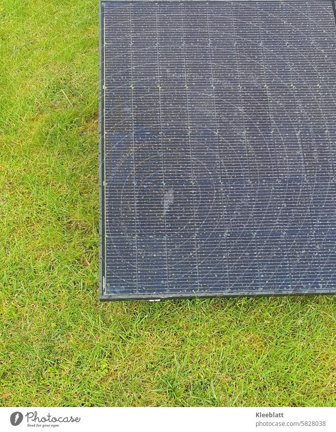 Solar panels lying in the green grass - Green electricity - homemade Solar collector Energy photovoltaics Technology Sun Alternative Electric Modern Sunlight