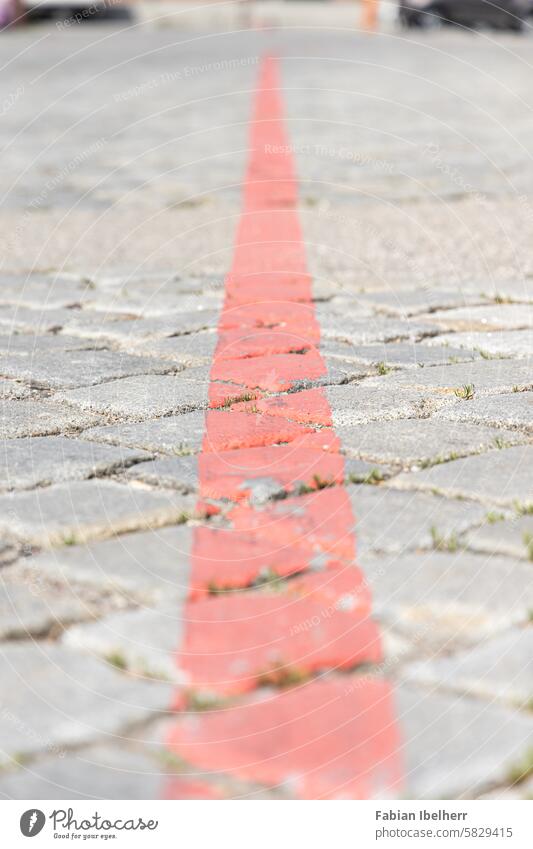 Road marking on cobblestones Lane markings Cobblestones Lane boundary Ground markings Germany