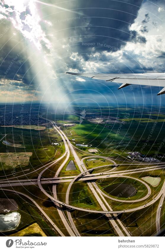 grind fly In the plane Aviation Colour photo Weather View from the airplane from on high Landscape fields Sunbeam Above Canada Exterior shot Sunlight