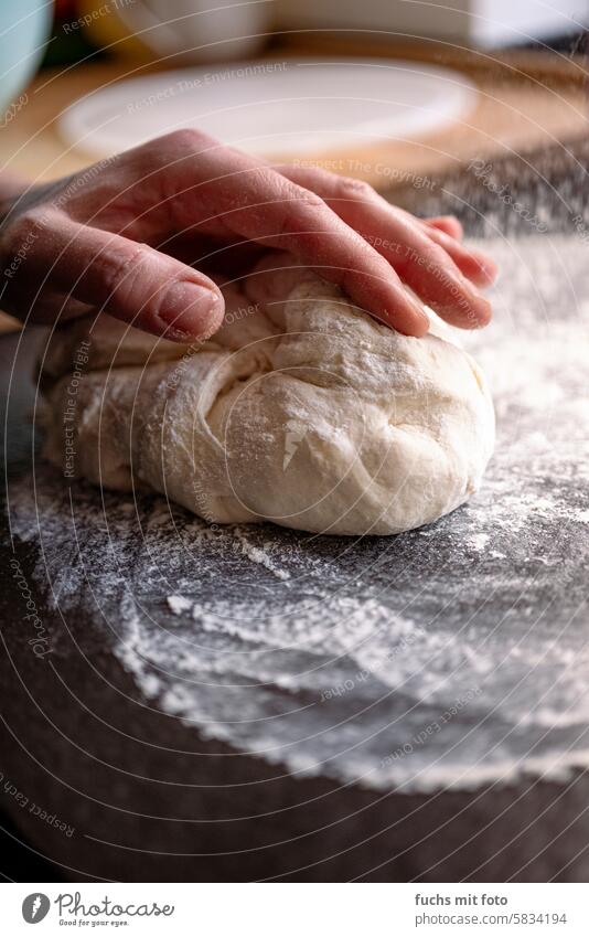 Knead the pizza dough. DIY Pizza Flour Baking Fingers Food Kitchen Cooking Bakery Bread Preparation Dough Wood Baked goods Raw Home-made Table recipe
