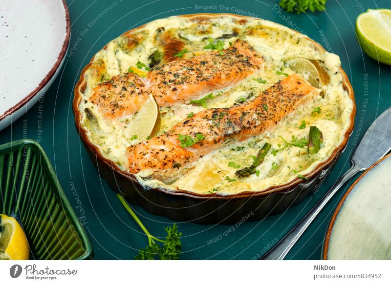Steamed salmon gratin. fish salmon casserole vegetable lunch fish casserole herb color image no people protein nourishment fish gratin serving asparagus health
