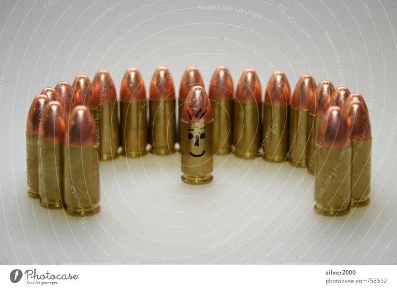 ammunition group Handgun Image type and genre Shoot Rifle Multiple Human being Munitions a personality in a group of anonymous people.