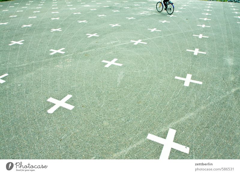 Bicycle on the Matrix Asphalt Berlin Relaxation Cycling Cycling tour Racing cyclist Garden triangular track Crucifix Recreation area Park Parking lot Places