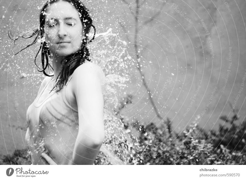 Water Dancer Feminine Young woman Youth (Young adults) 1 Human being 18 - 30 years Adults Drops of water Wall (barrier) Wall (building) Movement Rotate Power
