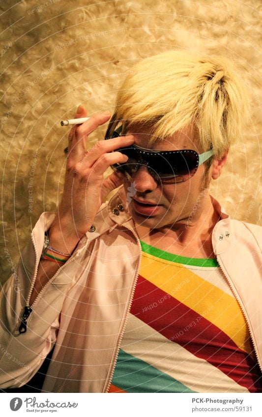 poser rock Model Man Sunglasses Blonde Eyeglasses Posture Cigarette Photo shoot Style Pop star Rocking Think Stop short Smoky Smoke-filled Human being Face
