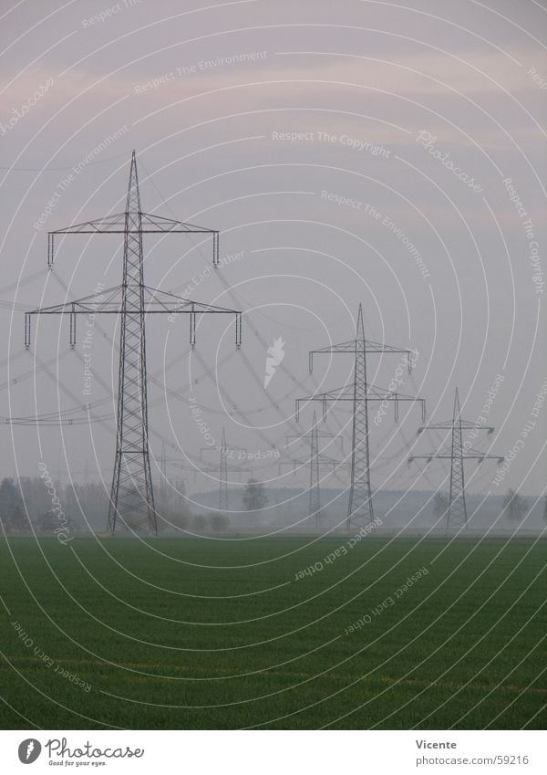 Electric 11 Electricity pylon High voltage power line High-power current Transmission lines Rustling Insulator Energy industry Tree Field Green Meadow Fog