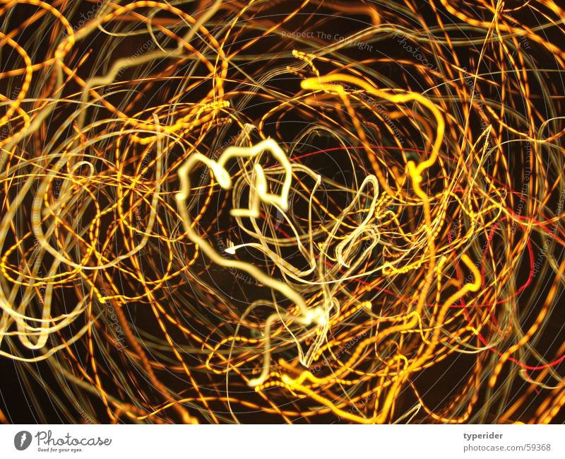 tangle of lights Chaos Light Camera tossing Muddled Long exposure Exposure Aperture Night Black Orange Cable Irritation